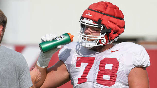 Razorbacks' offensive lineman Joshua Braun at practice outside Tuesday